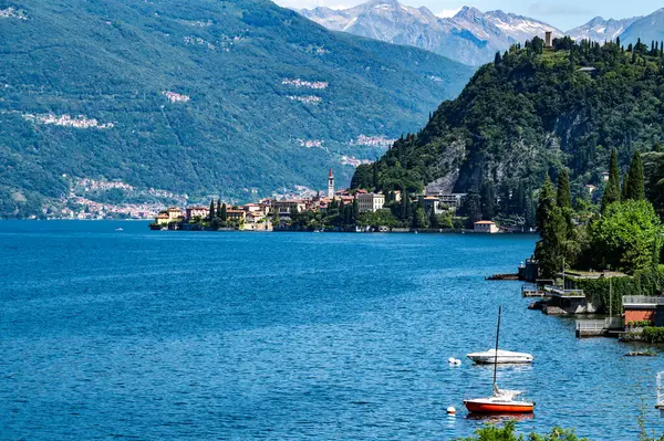 stock image The town of Varenna, on Lake Como, photographed from afar, and the castle of Vezio.