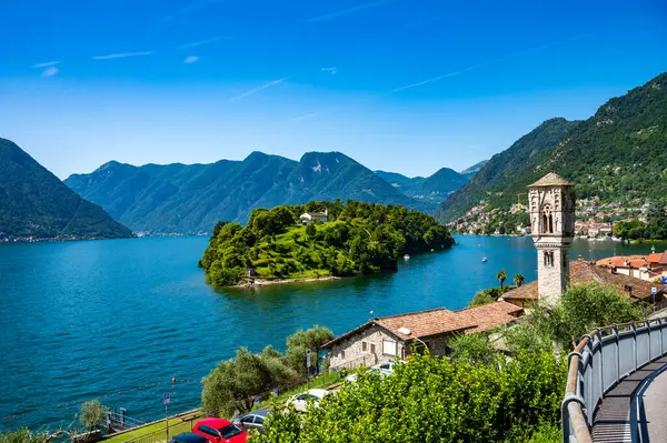 stock image Panorama of Lake Como, Ossuccio bell tower and Isola Comacina.