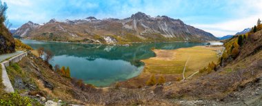 Upper Engadine, Lake Sils, and the village of Isola, photographed from above in autumn. clipart