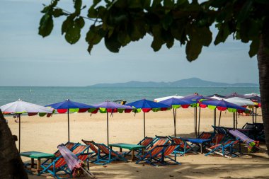Umbrella for rent at the Beach and coast at the Beach Road in the city of Jomtien near Pattaya in the Province of Chonburi in Thailand,  Thailand, Jomtien, November, 2022