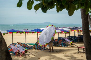 Umbrella for rent at the Beach and coast at the Beach Road in the city of Jomtien near Pattaya in the Province of Chonburi in Thailand,  Thailand, Jomtien, November, 2022
