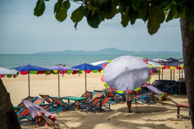 Umbrella for rent at the Beach and coast at the Beach Road in the city of Jomtien near Pattaya in the Province of Chonburi in Thailand,  Thailand, Jomtien, November, 2022