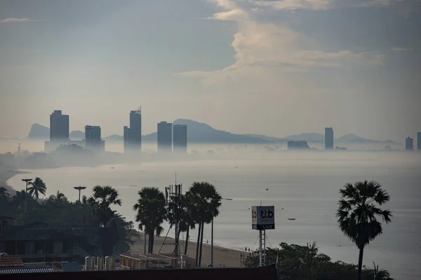the skyline by fog in the Town of Jomtien in the city of Jomtien near Pattaya in the Province of Chonburi in Thailand,  Thailand, Jomtien, November, 2022