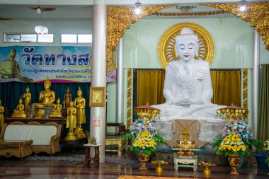 the white Buddha at the Wat Thang Sai the Town of Ban Krut in the Province of Prachuap Khiri Khan in Thailand,  Thailand, Ban Krut, December, 2022
