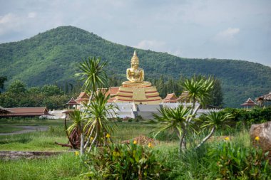 the Golden Buddha at the Wat Huay Mongkol near the City of Hua Hin in the Province of Prachuap Khiri Khan in Thailand,  Thailand, Hua Hin, December, 2022