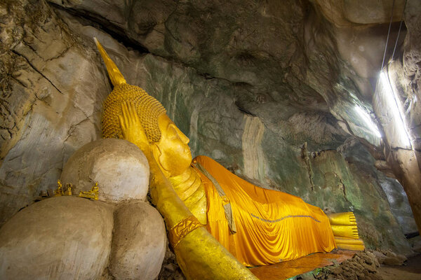 the Reclining Buddha Cave at the Wat Ao Noi near the City of Phrachuap Khiri Khan in the Province of Prachuap Khiri Khan in Thailand,  Thailand, Prachuap Khiri Khan, December, 2022