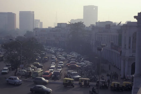 stock image a view of the shopping area of Connaught Place in the city of New Delhi in India.  India, Delhi, Februar, 1998