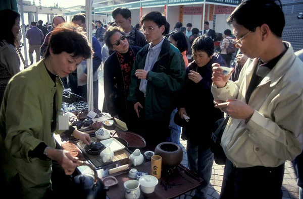 stock image a traditional Chinese Tea ceremony and Market in Kowloon in the city of Hongkong in Hongkong.  China, Hongkong, May, 1997