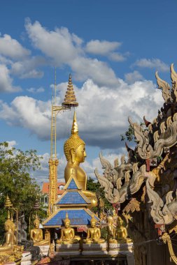 Wat Tai Phrachao 'daki Buddha Yai Ong Tue Ubon Ratchathani ve Tayland' daki Ubon Ratchathani.