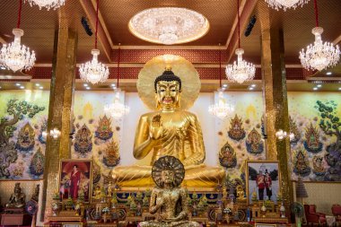 Thailand, Nakhon Pathom - November 13, 2023: Buddha figure inside of Wat Phai Lom in the city and Province Nakhon Pathom in Thailand. clipart