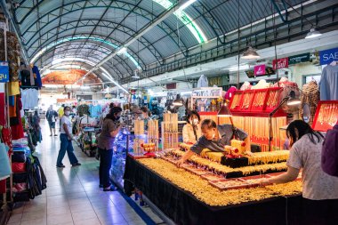 Thailand, Samut Prakan - December 7, 2023: Gold Shop in the Market Hall in the city center of Nakhon Pathom and Province Nakhon Pathom in Thailand.  Thailand, Nakhon Pathom, November 9, 2023. clipart