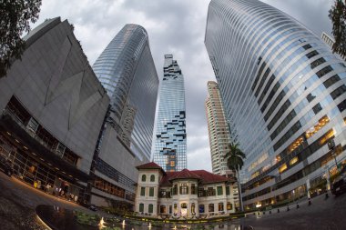 The House on Sathorn in front of King Power Mahanakhon Tower Building in the city of Bangkok in Thailand.  Thailand, Bangkok, December, 5, 2023 clipart