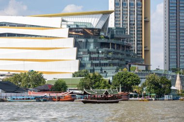 a view of the Iconsiam Shopping Mall at Chao Phraya River in Thonburi in the city of Bangkok in Thailand.  Thailand, Bangkok, December, 5, 2023 clipart