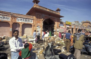 a food market street in the City of Jaipur in the Province of Rajasthan in India.  India, Jaipur, January, 1998 clipart