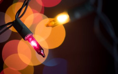 Christmas lights over on dark background
