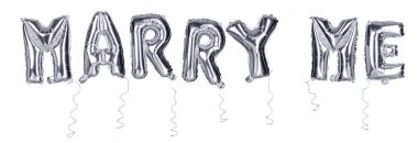 Words marry me made of silver inflatable balloon letters isolated on white background