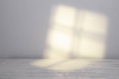 Window light and shadow drop on white wall background
