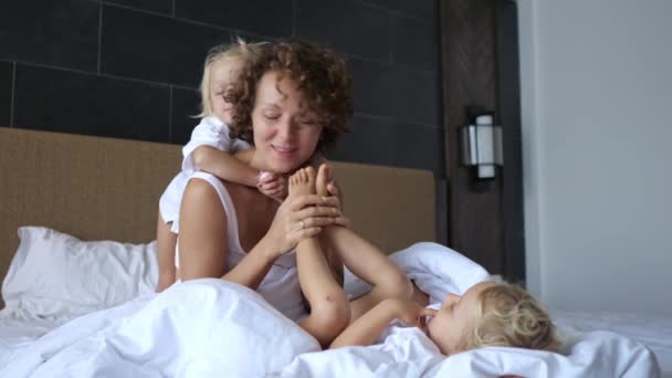 Love Care Young Woman Her Two Daughters Children Came Mom — Vídeo de Stock