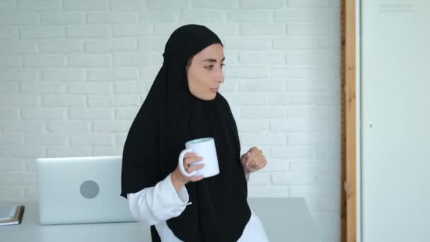 Cheerful Muslim Woman Dances Office Hard Work Laptop Beautiful Woman — Stockvideo