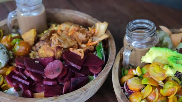 Appetizing Vegetable Dishes Vegetarian Restaurant Table Two Wooden Plates Large — Stockvideo