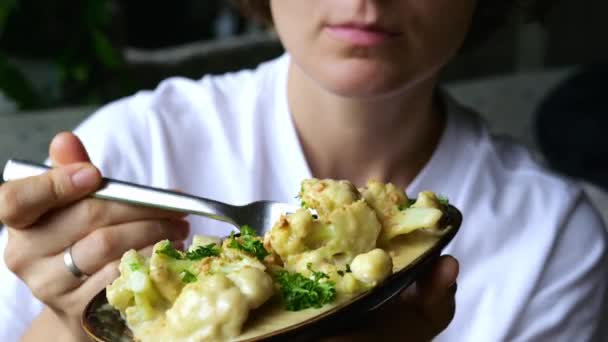 Woman Happy Eat Fashionable Vegan Dish Cauliflower Baked White Cheese — Videoclip de stoc