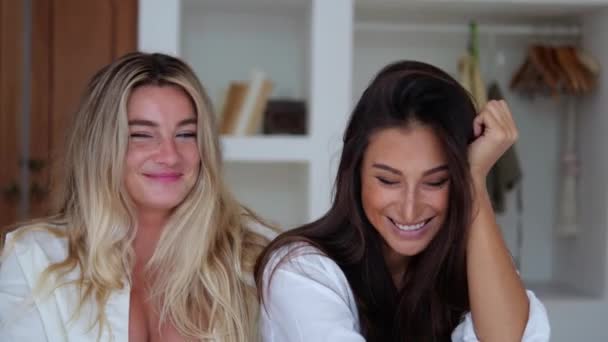 Two Female Friends Smile Sweetly Bed Next Each Other Bedroom — Wideo stockowe