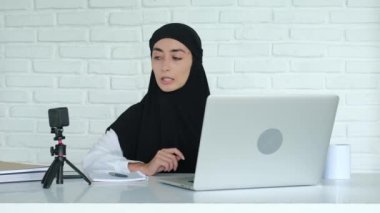 A Muslim woman leads her video blog about the equality of Muslim women. A woman in a hijab fights for the rights of women to be free to do what they love and the problems of prohibition in Islam.