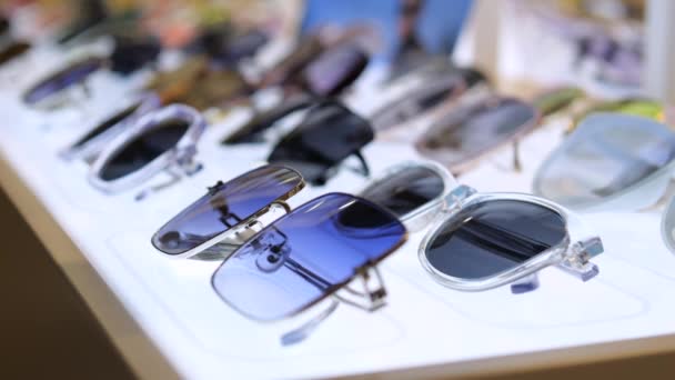 Closeup Stylish Models Sunglasses Display Accessories Glasses Graceful Shapes Bright — Stock Video