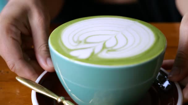 Cozy Moment Female Hands Delicately Hold Cup Hot Matcha Latte — Stock Video