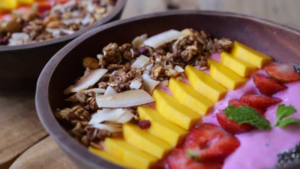 Two Smoothie Bowls Dynamic Video Few Pieces Mango Strawberries Some — Stock Video