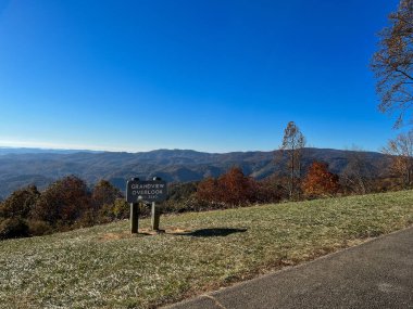 The view of the Grand Overlook on the beautiful Blue Ridge Parkway in Boone, NC during the autumn fall color changing season.