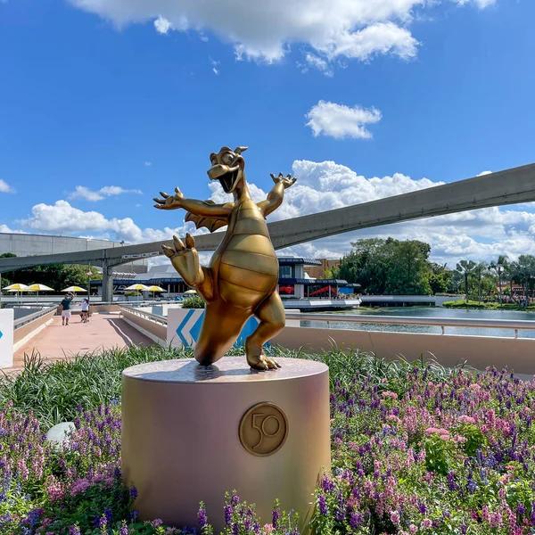 stock image Orlando, FL USA-  October 9, 2021: The 50th Anniversary statue of Figment at EPCOT  in Walt Disney World in Orlando, Florida.