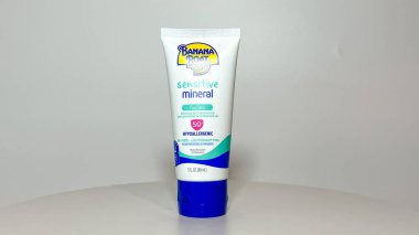 Orlando, FL USA - July 14, 2022:  A tube of Banana Boat Sensitive Mineral suntan lotion on a white background.