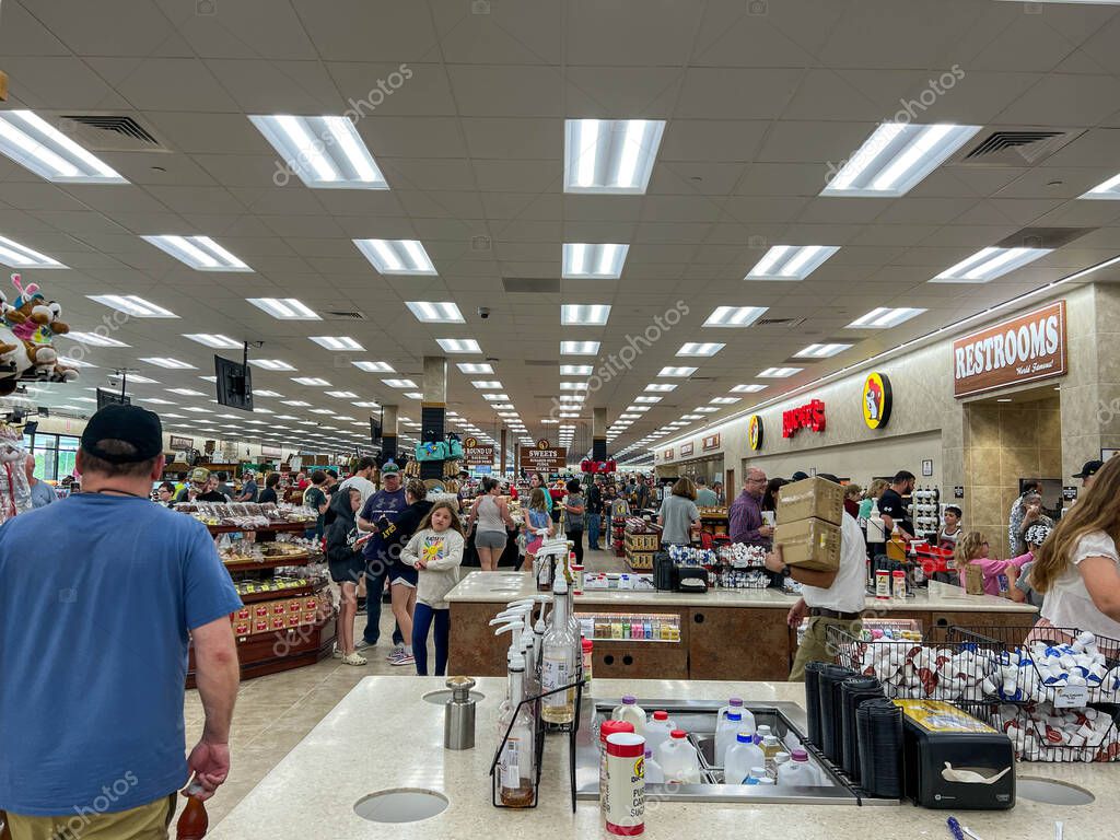 Daytona Beach, FL USA - February 25,2023:  People shopping for food and drinks at the  Buccees convenient store in Daytona Beach, Florida.