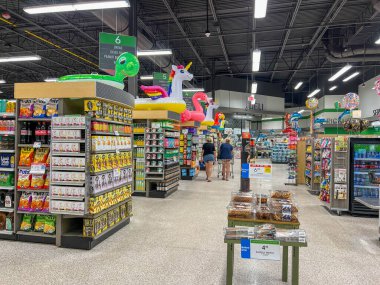 Rosemary Beach, FL USA - August 2, 2023:  People shopping in a Publix grocery store near Rosemary Beach, Florida along the popular tourist spot Highway 30A. clipart