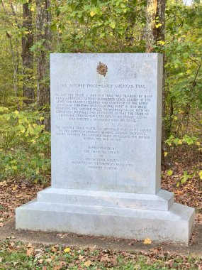 Hohenwald, TN USA - October 9, 2023: A monument explaining the history of the Natchez Trace Parkway along the Natchez Trace Parkway. clipart
