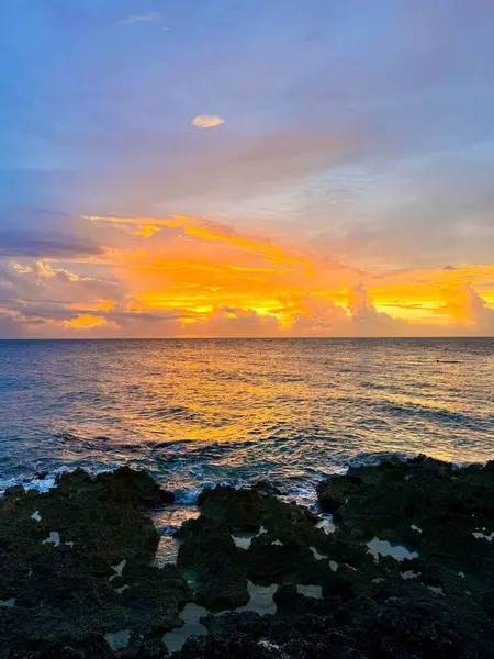 stock image A view of the ocean in Grand Cayman Island with a beautiful summer sunset in West Bay.