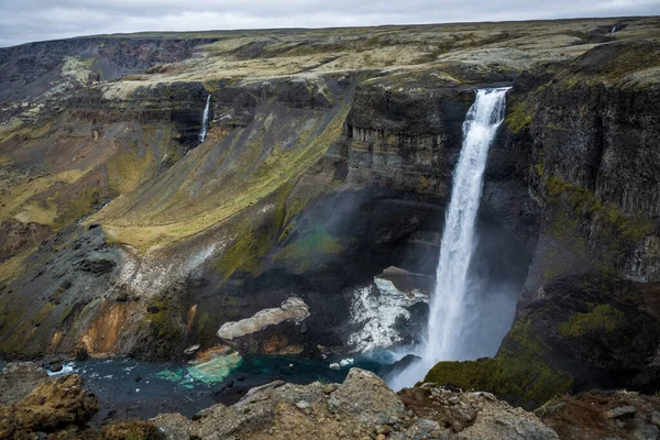 stock image View of famous Haifoss waterfall on the Fossa river near the volcano Hekla. Travel to Iceland. Treking in Iceland. Travel and landscape photography concept.