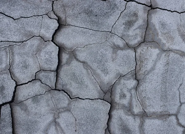 Eski çatlak alçı duvar, çatlak kaba afiş yüzeyi.