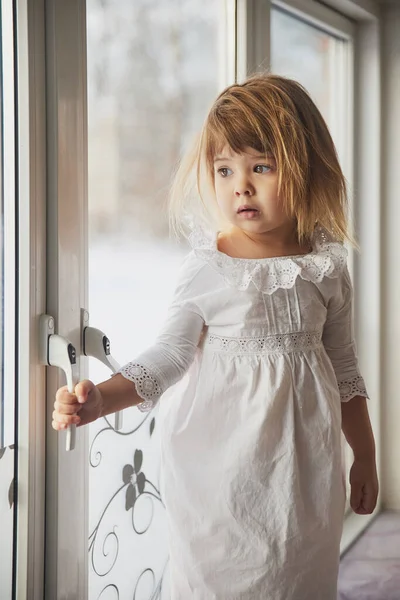 Adorable Baby Nightgown Windowsill Royalty Free Stock Photos