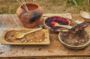 Ancient Viking kitchen utensils at a festival in Denmark.
