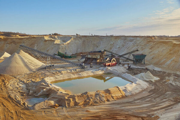 Huge sand Quarry in Denmark at sunset.