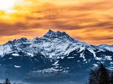Swiss Alps winter landscape with snow and sun, Europe