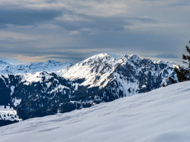 Swiss Alps winter landscape with snow and sun, Europe
