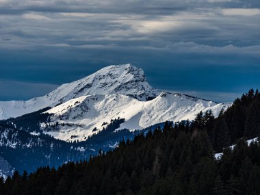 Swiss Alps winter landscape with snow and sun, Europe