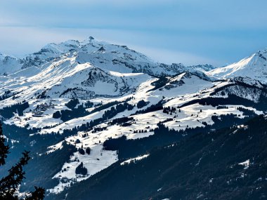 Swiss Alps winter landscape with snow and sun, Europe