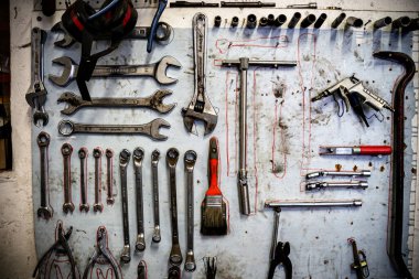 Auto repair shop, garage, tire fitting. Numerous car repair tools.