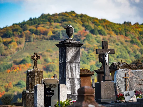 stock image Old rickety stone monuments in the cemetery. Geometric chaos of crosses and tombstones. Memory and history. France.