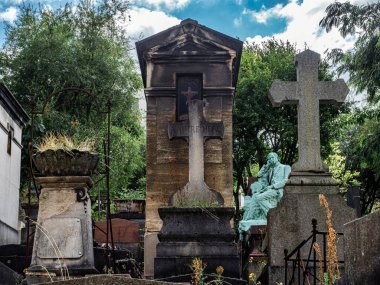 Saint-Vensant cemetery in Paris near Montmartre. Beautiful monuments of famous people. clipart