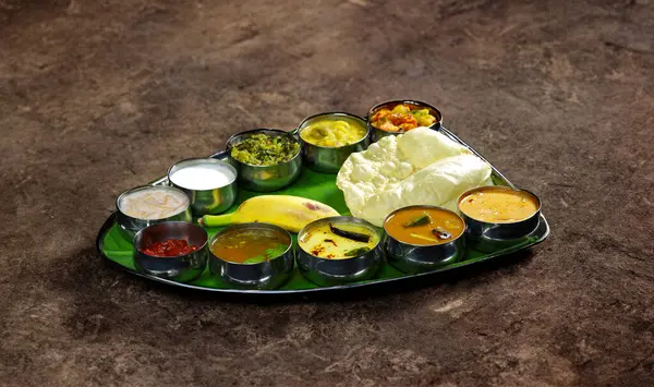 indian food in plate on black background